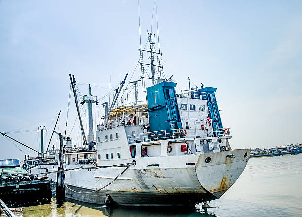 istock Big boat on pier in thailand 497488171