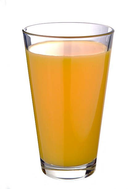 istock glass of orange juice 497488257