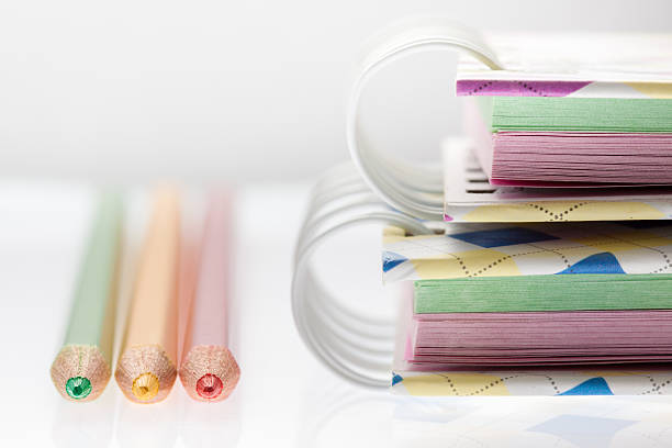 istock Closeup color pencil and notebook,Selective focus. 497489445