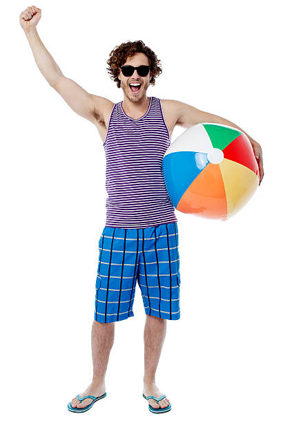 istock Excited young man raising his arm 497489873