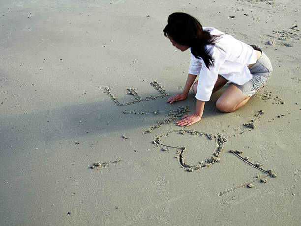 istock woman on the beach 497490343