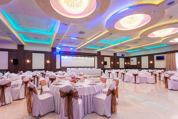 Banquet hall with colorful lights stock photo