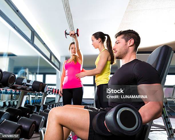 Dumbbell Man At Gym Workout Fitness Weightlifting Stock Photo - Download Image Now - 20-29 Years, Active Lifestyle, Activity