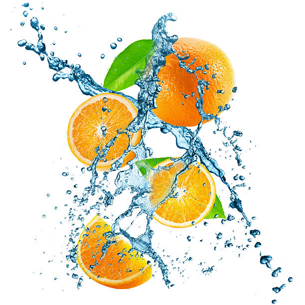 istock oranges with water splash isolated on the white background 497490790
