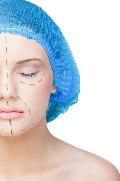 istock Relaxed young patient with dotted lines on the face 497491255