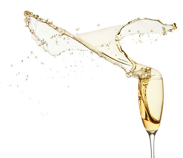 istock splash of champagne isolated on the white background 497492176