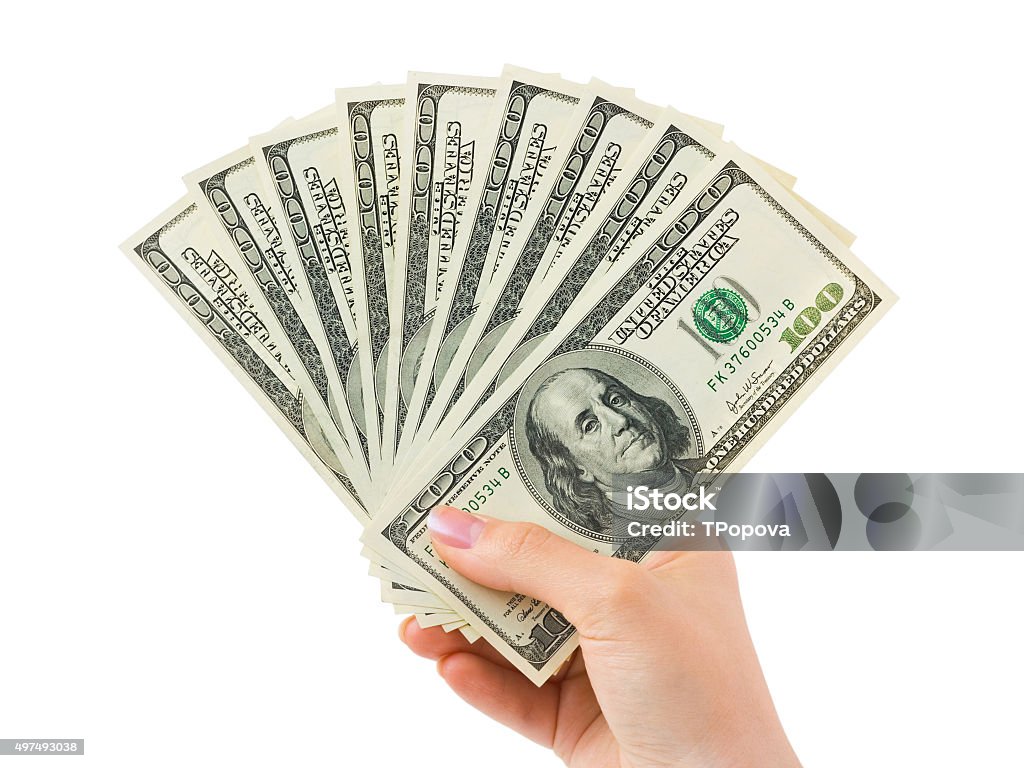 Hand with money Hand with money isolated on white background 2015 Stock Photo
