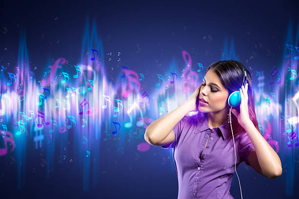 istock woman enjoying in music 497493785