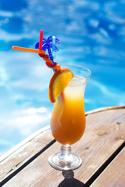istock Refreshing coctail near swimming pool on vacation 497494791