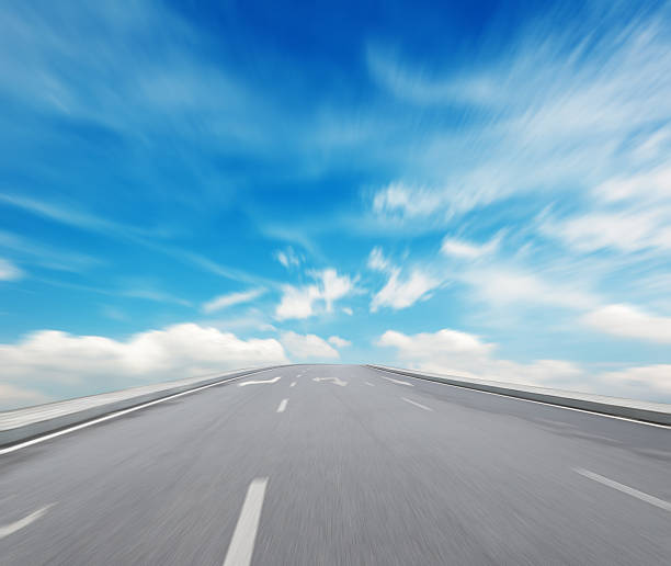 istock high way blue sky to Travel Destination journey 497495261