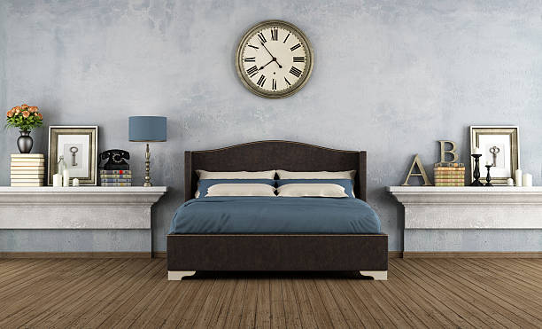 istock Blue and gray bedroom with vintage clock 497509621