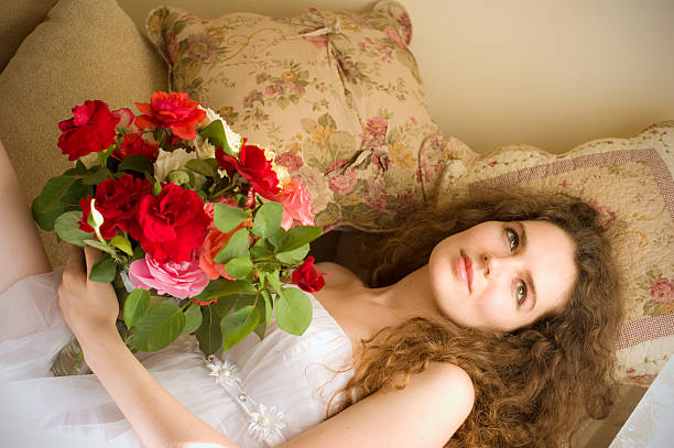 istock girl with roses 497509985