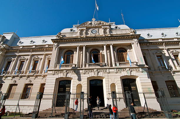 Argentine Flag flying in the wind atop Argentina Surpreme Court (Corte Suprema de Justicia de la Nación) in Buenos Aires near 9 de Julio and Plaza Lavalle