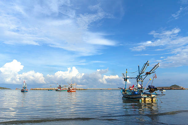 istock Fishing boat and blue sky 497511075