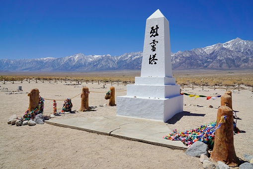 Lone Pine, California, USA - May 25, 2014: Memorial dedicated to the prisoners of the Manzanar National Historic Site in California. Manzanar was a relocation center where the US government under  President Franklin D Roosevelt ordered the incarceration of over 110,000 Japanese-Americans during World War II.