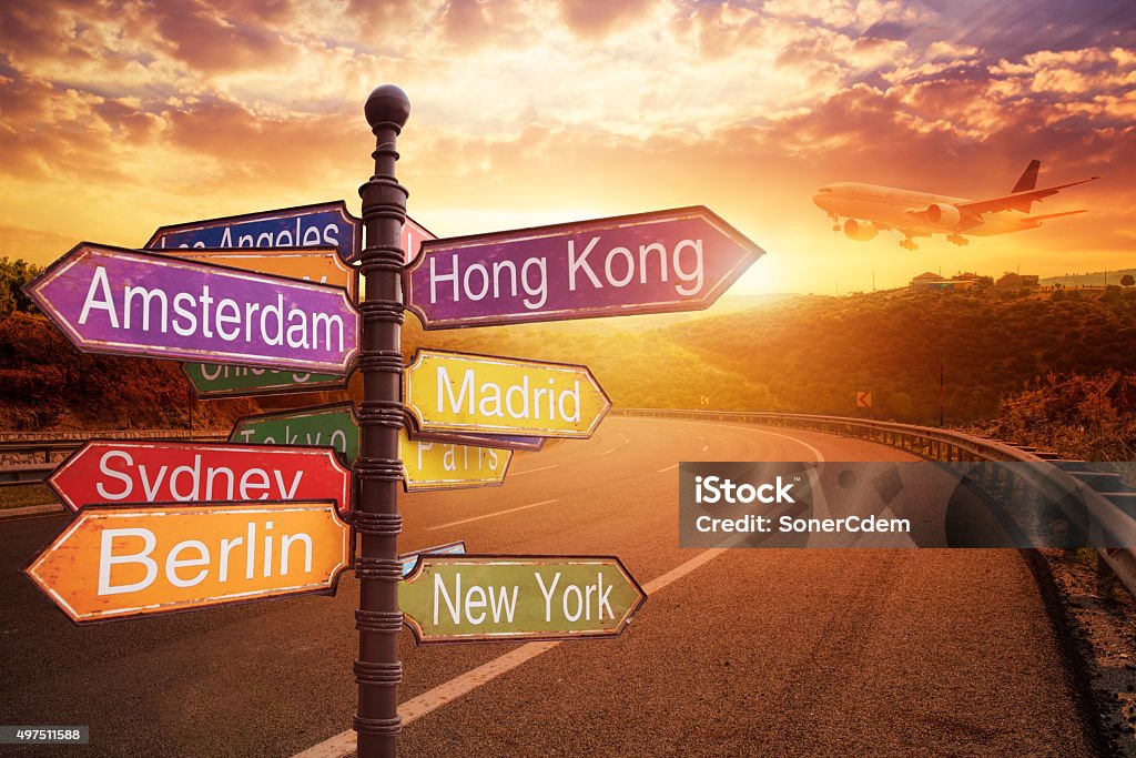 signboard with directions to Countries Travel Destinations Stock Photo