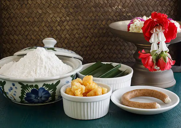 Photo of flour , pandan leaf and palm sugar.