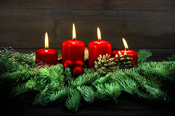istock Advent decoration. Four red burning candles. Vintage style 497512476