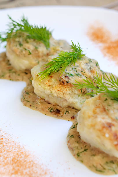 istock Meatballs served in a dill sauce on a white plate. 497513014