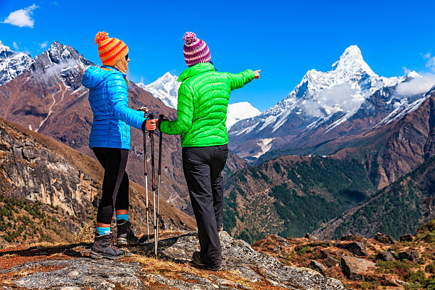 istock Women looking at Ama Dablam, Mount Everest Region 497515932