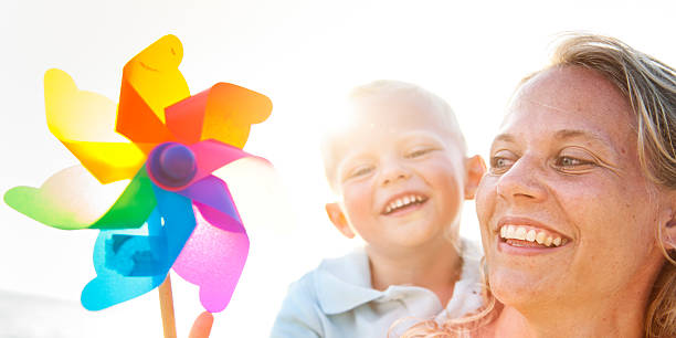 istock Mother Son Happiness Beach Summer Concept 497516806