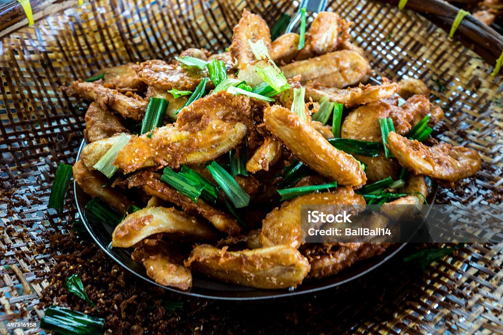 deep-fried sliced banana deep-fried sliced banana in threshing basket Banana Stock Photo