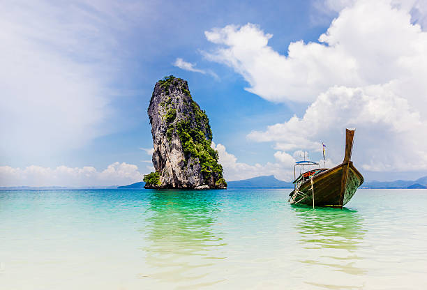 istock Long-tail Taxi boat on the beautiful beach 497518962