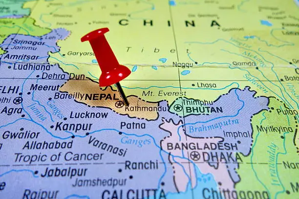 pushpin marking on Nepal map