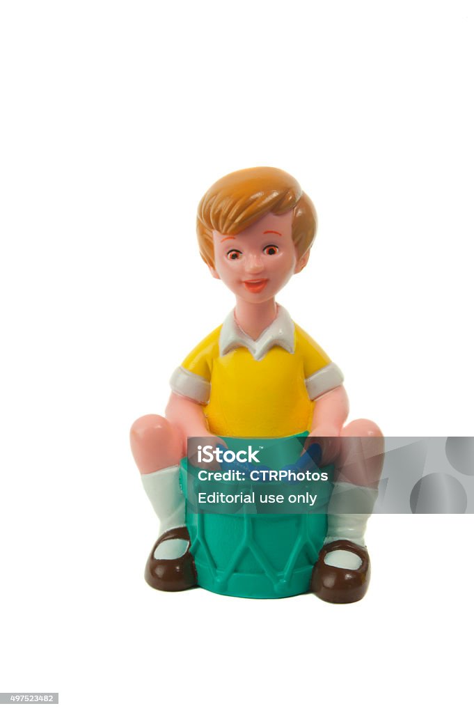 Christopher Robin Figurine Adelaide, Australia - April 21, 2015: A Christopher Robin figurine isolated on a white background from the popular A. A. Milne Winnie the Pooh stories. Merchandise from Winnie the pooh are highly sought after collectables. Christopher Robin Milne Stock Photo