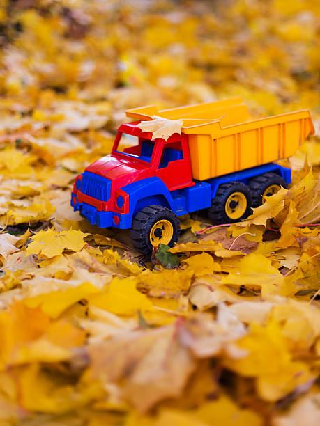istock Toy car truck outdoors autumn 497523786