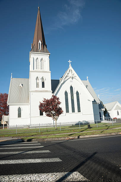 White church with pedestrian crossing, in Cambridge, NZ.