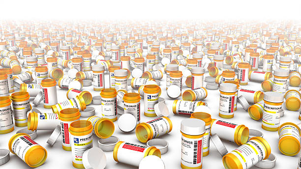 Front view of empty pill bottles stock photo