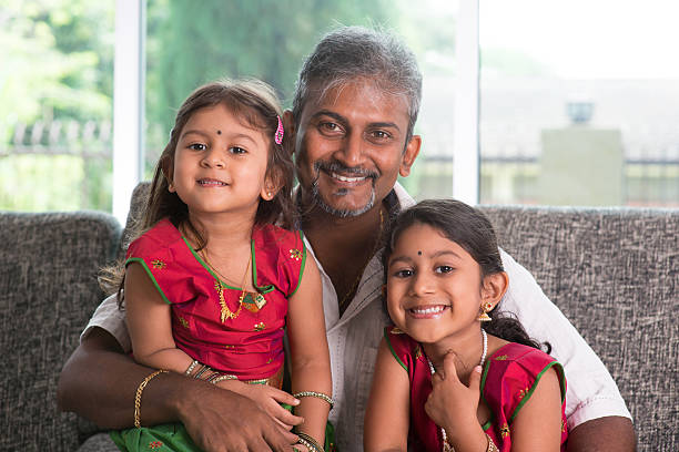 istock Portrait of father and daughters 497526537