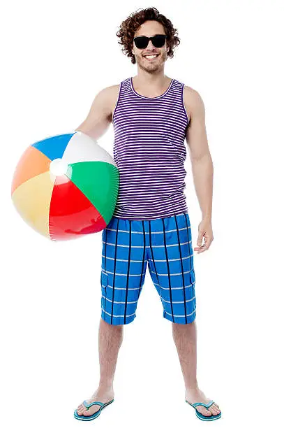 Photo of Cheerful guy ready to play beach ball