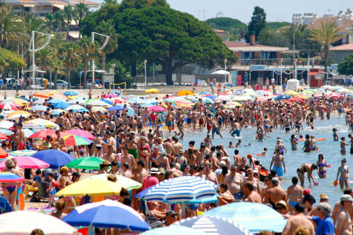 Crowded beach at summer, in Spain