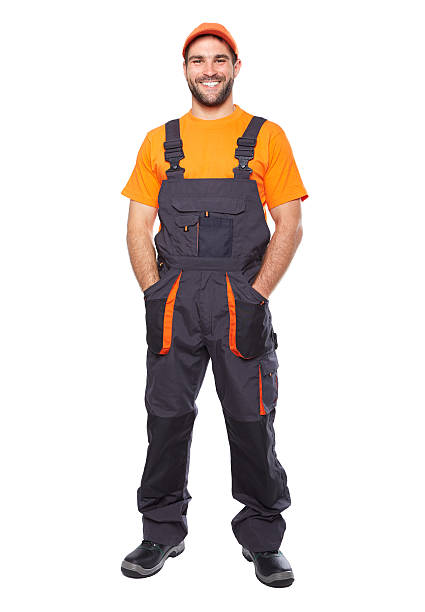 istock Portrait of smiling worker in blue uniform 497527087