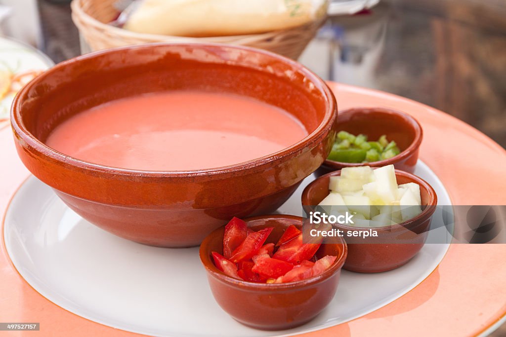 Gaspacho - cold tomato soup with ingredients Typical ice-cold and spicy vegetable soup of Andalusia, Spain Appetizer Stock Photo