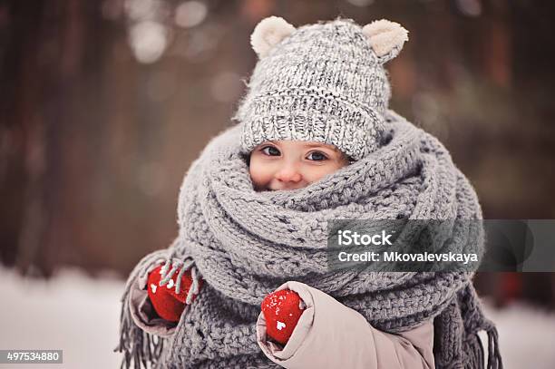 Cozy Outdoor Portrait Of Happy Toddler Child Girl In Winter Stock Photo - Download Image Now