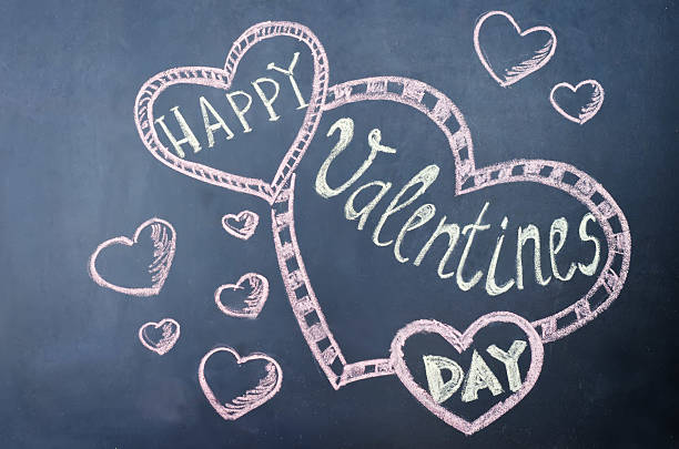 istock happy Valentines day written on the chalk Board 497536006