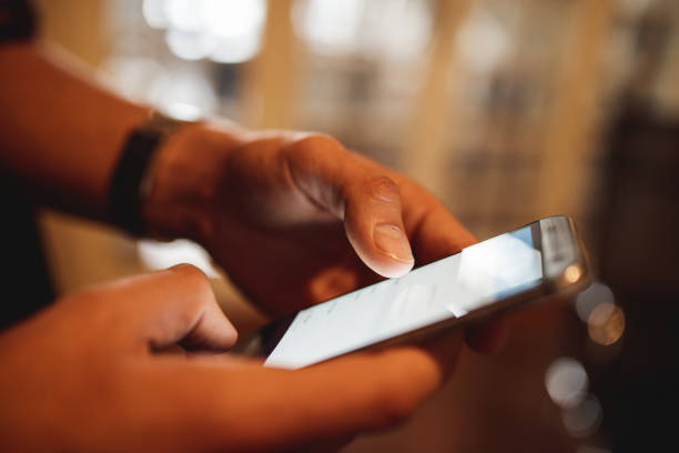 istock Close up of unrecognizable person using mobile phone. 497536226