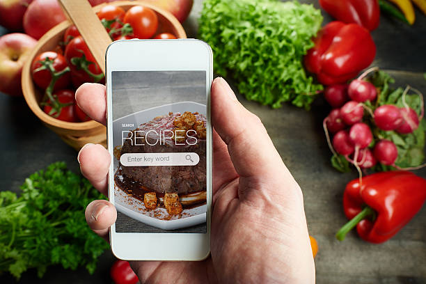 istock Food recipes on smart phone 497536328