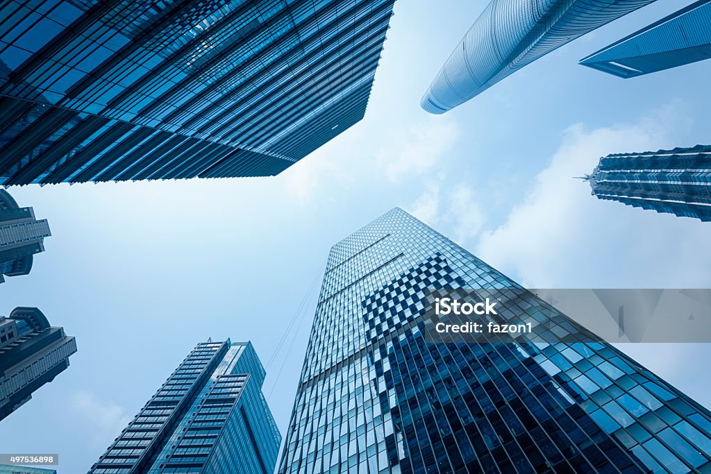 Skyscrapers of Shanghai. Modern office buildings in Lujiazui district, Shanghai.  Shanghai World Financial Centre, Shanghai Tower and Jin Mao Tower and another skyscrapers. Shanghai Tower is newest and the tallest of a group of the supertall buildings in Lujiazui. Directly Below Stock Photo