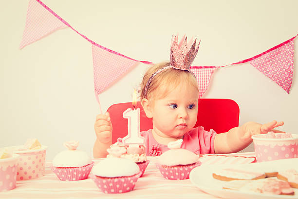 istock cute little princess at first birthday 497537348