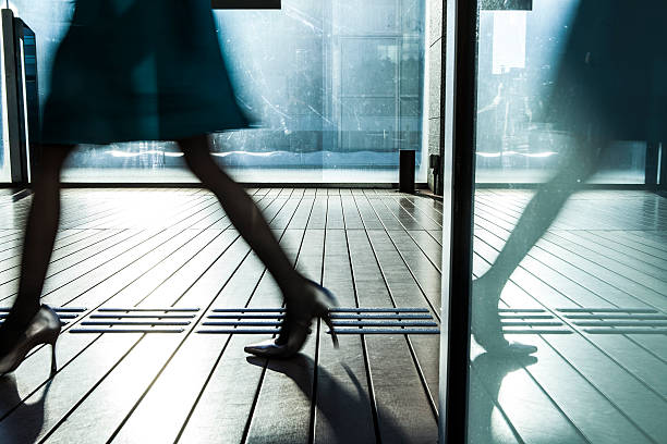 Woman it is glass door easy reflection Woman it is glass door easy reflection women high heels stock pictures, royalty-free photos & images