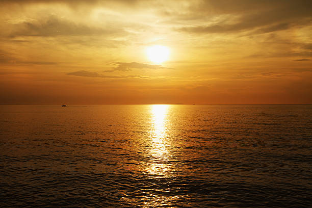 istock golden sea sunset 497542116