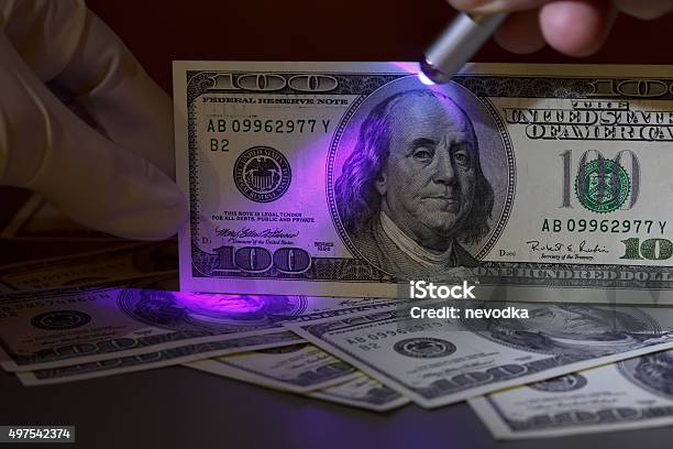 Dollar Bill In Uv Light Stock Photo - Download Image Now - Crime, Currency, Scientific Experiment