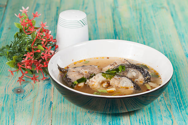istock Tomyam ,Sneck head fish on spicy soup 497542822