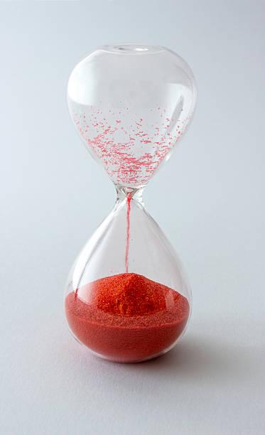istock Hourglass with red sand - time expired 497544349