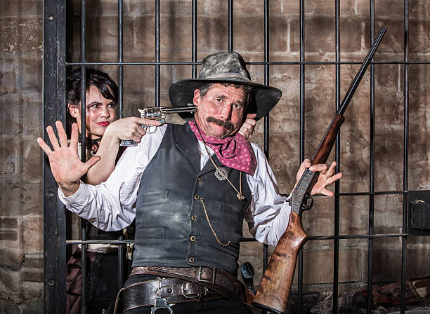 istock Female Prisoner Steals Gun 497544801