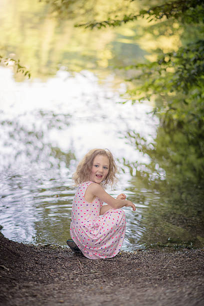 istock little feet in the water 497545409